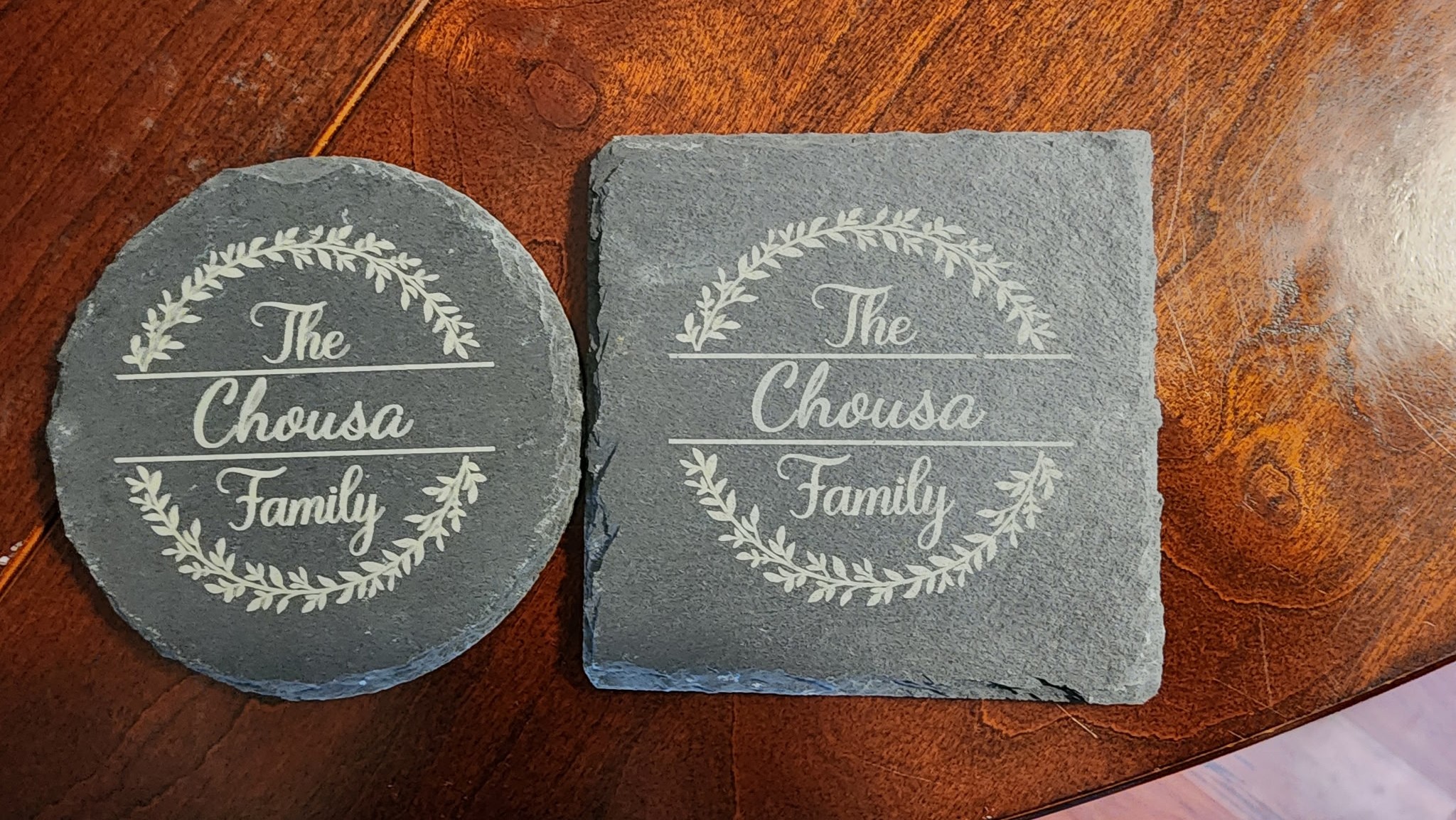 Personalized slate coasters with elegant text design